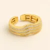 Anel Dourado Zircónias Ondas Triplas, referência 4918-Q032-1