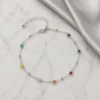 Tornozeleira Prateada com Flores Coloridas, referência 83495-06-B