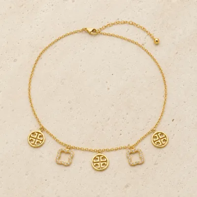 colar pavé 83505-05 dourado sobre pedra clara de tom quente