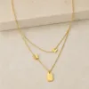 colar dourado duplo borboletas, variante dourada, pedra clara, referência 83544-02