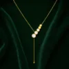 colar dourado em Y, fundo branco, referência 83712-04