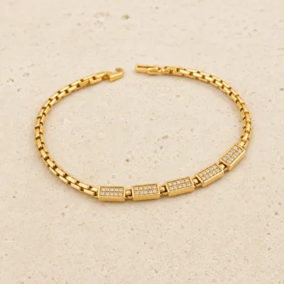 Pulseira dourada cristais 83977-01 modelo B placas retangulares pavé sobre pedra clara