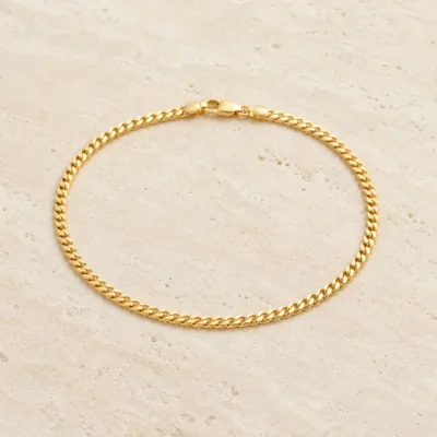 Pulseira dourada elo gourmet 83979 Modelo B sobre pedra clara