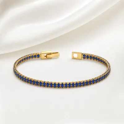 Pulseira tennis dupla linha 83980 modelo C azul dourada sobre cetim marfim