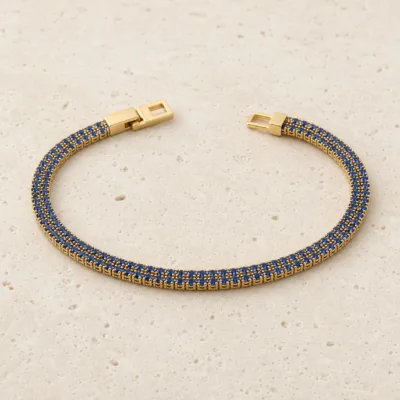 Pulseira tennis dupla linha 83980 modelo C azul dourada sobre pedra clara