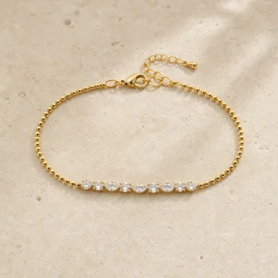 Pulseira cristais brancos 83984 modelo C com linha de cristais sobre pedra clara