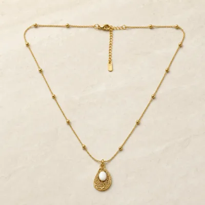 colar pendente gota branco, variante dourada, pedra clara, referência 84055-01