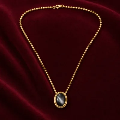 colar com pendente oval, variante dourada, pedra clara, referência 84269-01