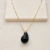 colar dourado gota preta, variante dourada, pedra clara, referência 84793-01