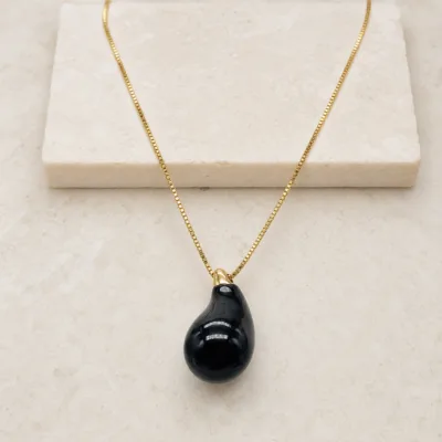 colar dourado gota preta, variante dourada, pedra clara, referência 84793-01