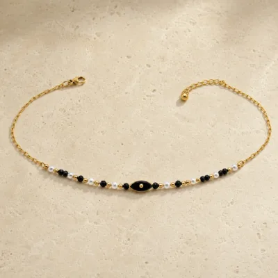 colar dourado pérolas pedras amuletos modelo E Olho Preto Central em pedra clara