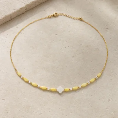 colar dourado com pérolas e contas amarelas, C — Flor Marfim e Contas Limão, em pedra clara de tom quente, referencia 85182-03