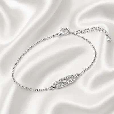 pulseira com cristais prateado em cetim marfim, referência 85203-01