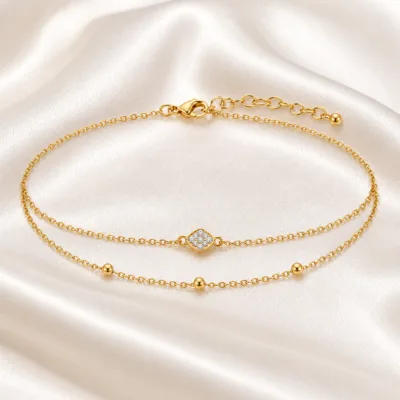 pulseira dupla com cristais dourado em cetim marfim, referência 85203-02