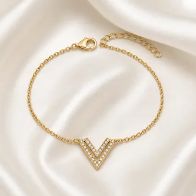 pulseira com duplo V dourado em cetim marfim, referência 85203-03