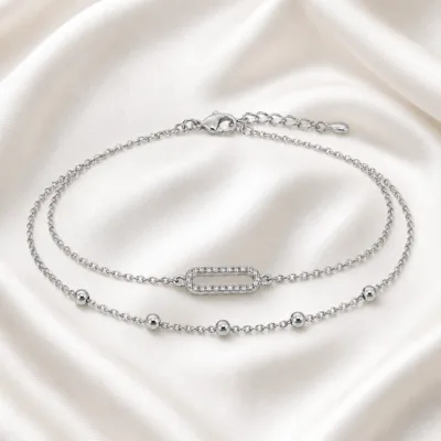 pulseira dupla com elo oval prateado em cetim marfim, referência 85203-04