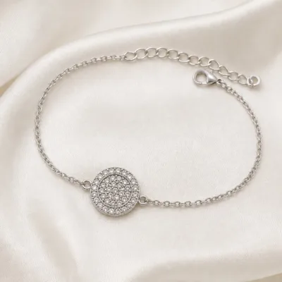 pulseira com medalhão circular prateado em cetim marfim, referência 85203-05