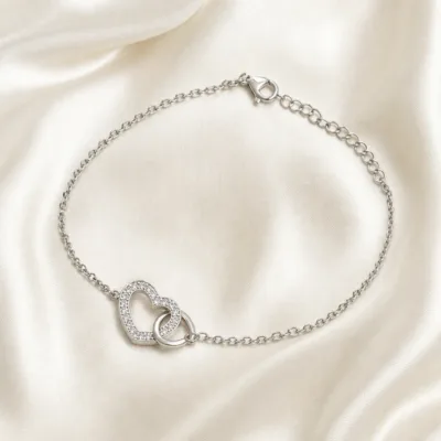 pulseira com corações entrelaçados prateada em cetim marfim, referência 85203-09