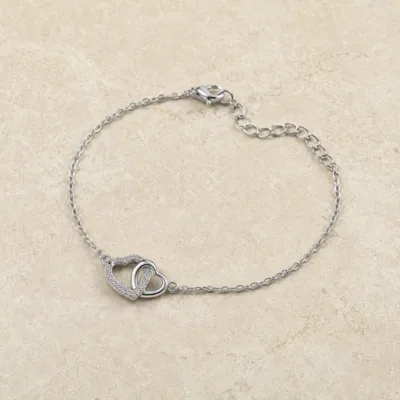 pulseira com corações entrelaçados prateada em pedra clara de tom quente, referência 85203-09