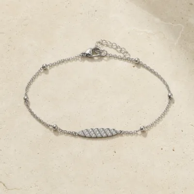 pulseira com folha de cristais prateado em pedra clara de tom quente, referência 85203-10