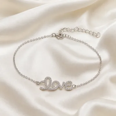 pulseira Love com cristais prateado em cetim marfim, referência 85203-11
