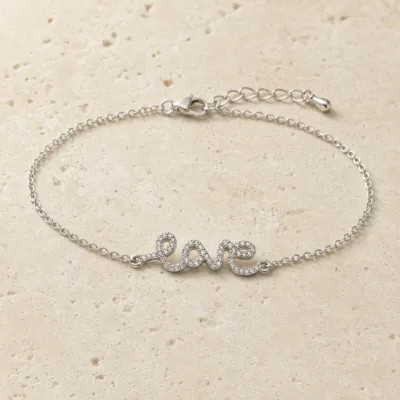 pulseira Love com cristais prateado em pedra clara de tom quente, referência 85203-11