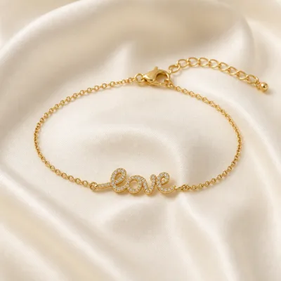 pulseira Love com cristais dourado em cetim marfim, referência 85203-11
