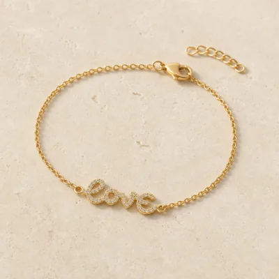 pulseira Love com cristais dourado em pedra clara de tom quente, referência 85203-11