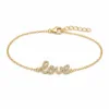 pulseira Love com cristais dourado em fundo branco, referência 85203-11
