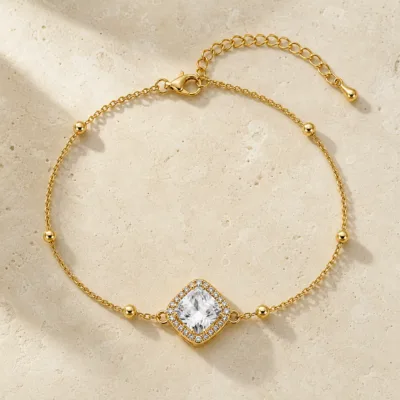 pulseira dupla com cristais dourado em pedra clara de tom quente, referência 85204-01