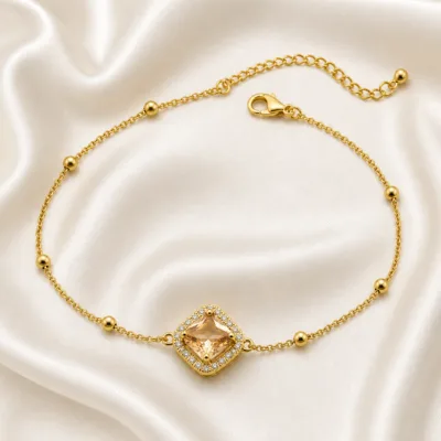 pulseira dupla com cristais dourado em cetim marfim, referência 85204-03