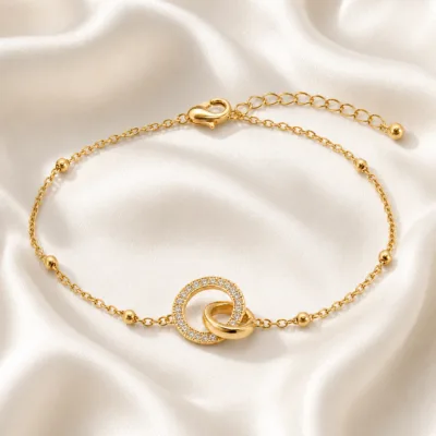 pulseira dupla com cristais dourado em cetim marfim, referência 85204-06