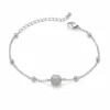 pulseira esfera pavé prateada em fundo branco, referência 85204-07