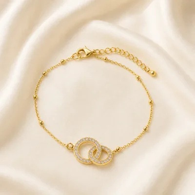 pulseira dupla com cristais dourado em cetim marfim, referência 85204-08