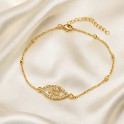 pulseira dupla com cristais dourado em cetim marfim, referência 85204-09