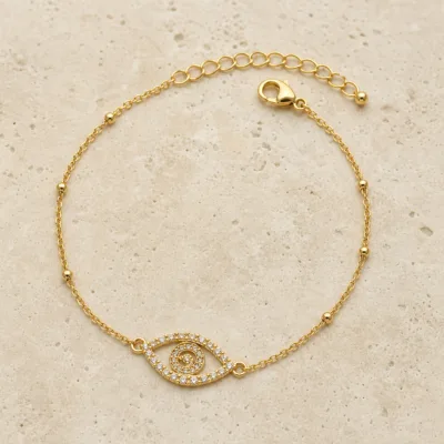 pulseira dupla com cristais dourado em pedra clara de tom quente, referência 85204-09