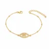pulseira dupla com cristais dourado em fundo branco, referência 85204-09