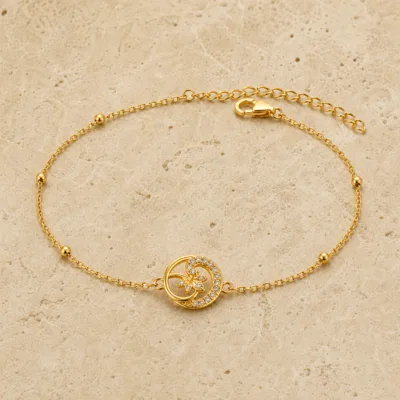 pulseira com roseta de cristais dourado em pedra clara de tom quente, referência 85204-10