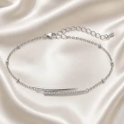 pulseira com barras assimétricas prateado em cetim marfim, referência 85204-13