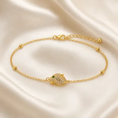 pulseira com cabeça de pantera dourado em cetim marfim, referência 85204-14