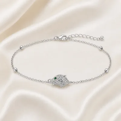 pulseira com cabeça de pantera prateado em cetim marfim, referência 85204-14