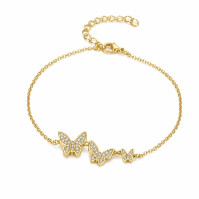 pulseira com três borboletas de cristais dourado em fundo branco, referência 85204-16