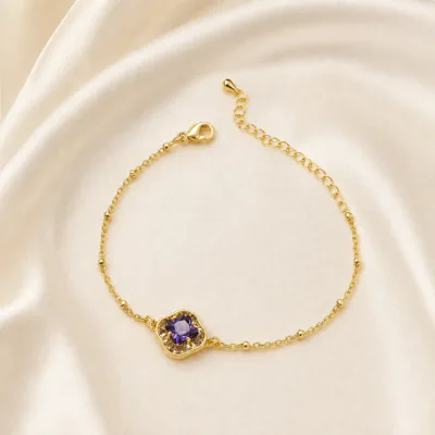 pulseira com flor violeta de cristais dourado em cetim marfim, referência 85204-22