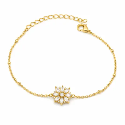 pulseira com flor de oito cristais dourado em fundo branco, referência 85204-23