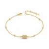 pulseira com cilindro pavé de cristais dourado em fundo branco, referência 85204-25