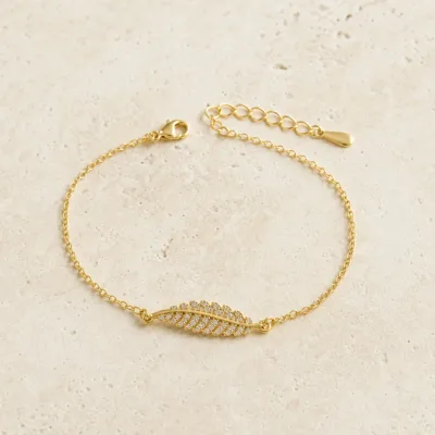 pulseira dupla com cristais dourado em pedra clara de tom quente, referência 85204-26