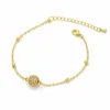 pulseira esfera pavé dourada em fundo branco, referência 85204-30