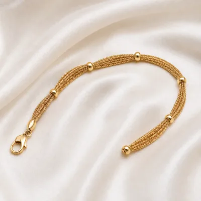 pulseira dourada de corrente multifiada em cetim marfim, referencia 85245-01