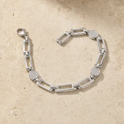 pulseira prateada com elos retangulares em pedra clara de tom quente, referencia 85246-01