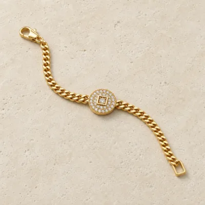pulseira dourada com medalhão de cristais em pedra clara de tom quente, referencia 85247-02